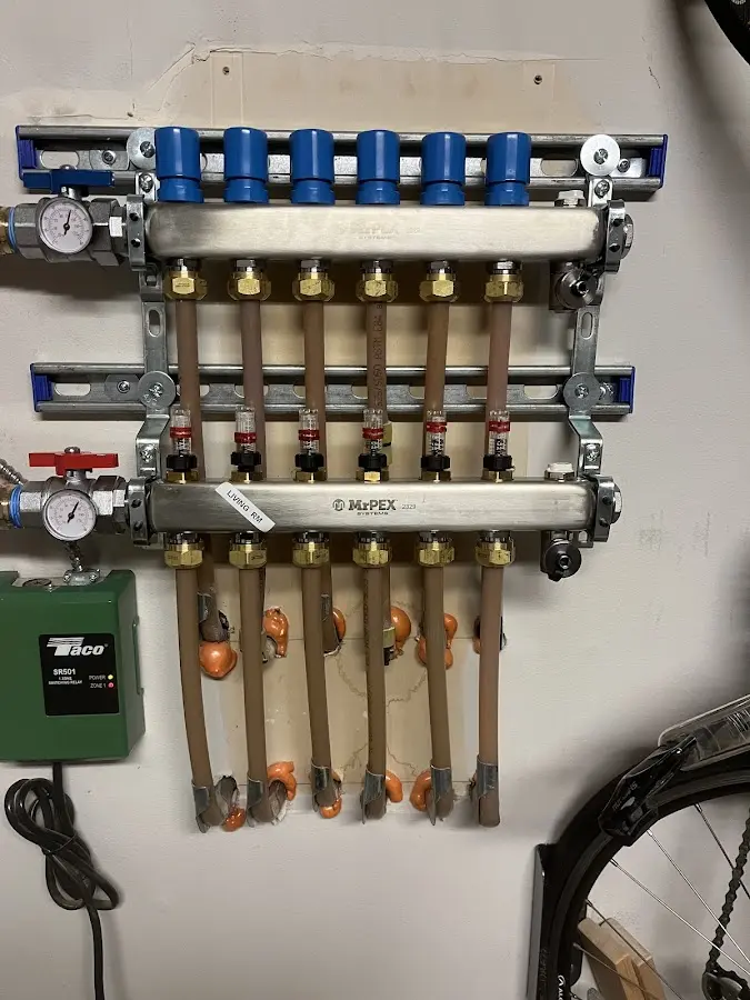 Plumber performing Water Heater Repair at a residential property in Danville